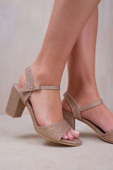 PAITYN BUCKLE UP LOW BLOCK HEEL SANDAL IN CHAMPAGNE GOLD GLITTER