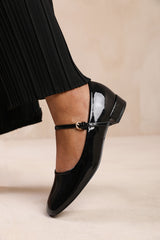 MINSK LOW HEEL WITH STRAP AND BUCKLE DETAIL IN BLACK PATENT