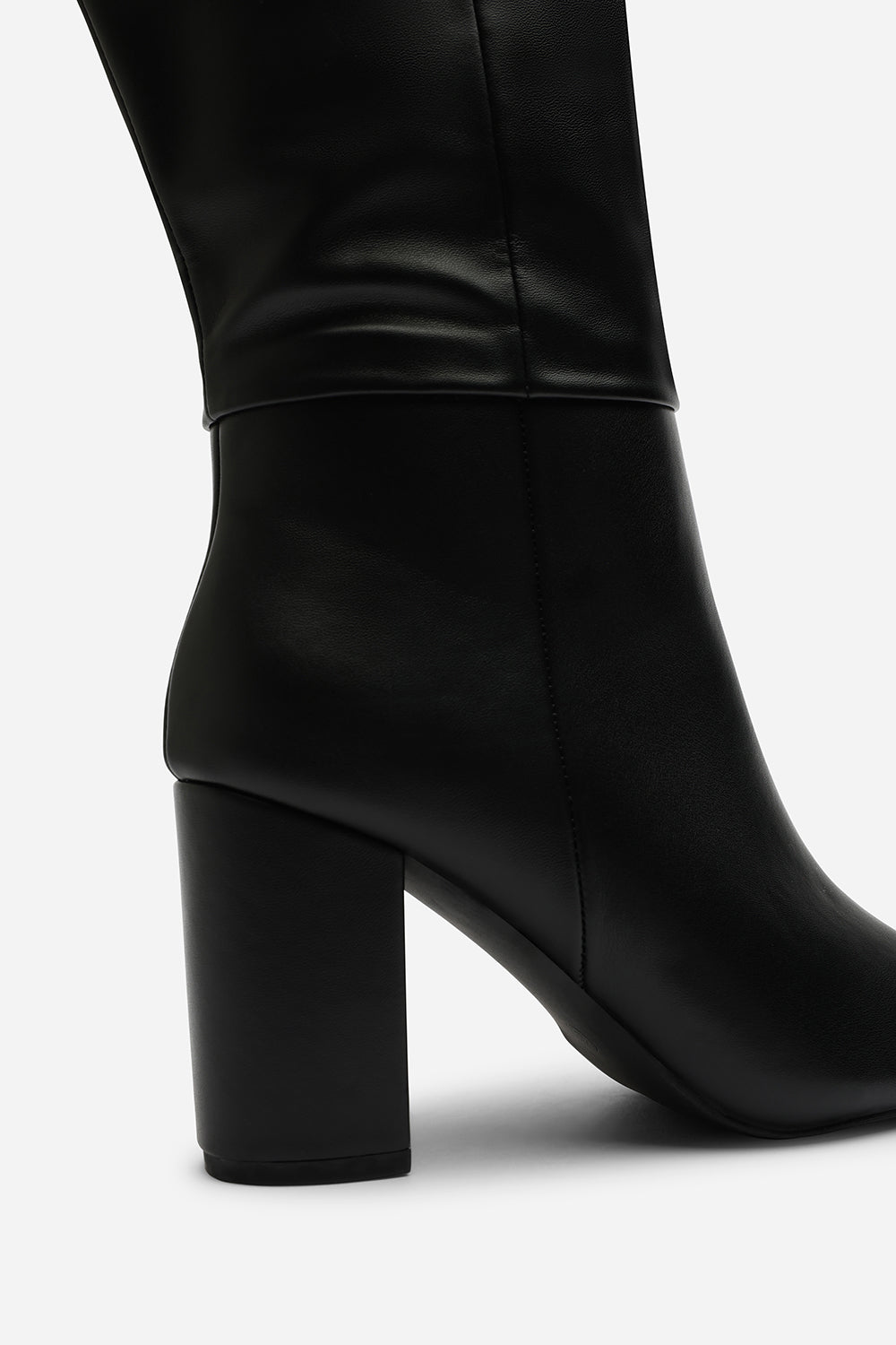 Evixa Knee High Pointed Toe Block Heel Boot