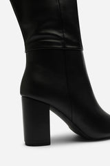 Evixa Knee High Pointed Toe Block Heel Boot