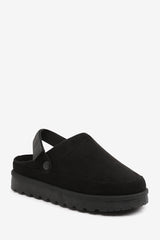 ALONDRA SLIP ON ADJUSTABLE STRAP MINI BOOTS IN BLACK SUEDE