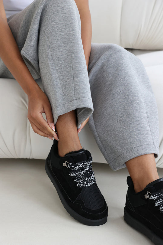 Lumina Black Suede Low Top Trainer with mesh panel and Faux fur lining