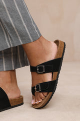 RIO TWO STRAP FLAT SANDALS WITH TOE LOOP AND BUCKLE DETAIL IN BLACK NUBUCK