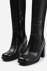 ZHURI STRETCH WIDE CALF BLOCK HEEL KNEE HIGH BOOTS IN WIDE E FIT IN BLACK FAUX LEATHER