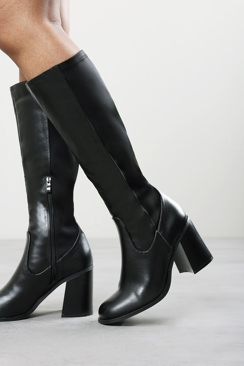 Nylis Black Stretch Panel Knee High Flared Block Heel Boots