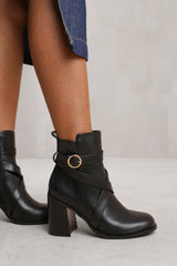 TEAGAN ANKLE BOOT WITH CHUNKY HEEL AND CROSS OVER STRAP DETAIL IN BLACK FAUX LEATHER