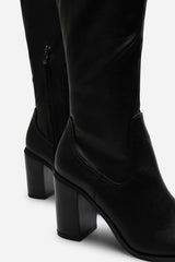 Farah Knee High Block Heel Boots in Stretch Black Faux Leather