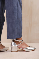 PERU CROSS OVER ANKLE STRAP LOW BLOCK HEEL IN SILVER