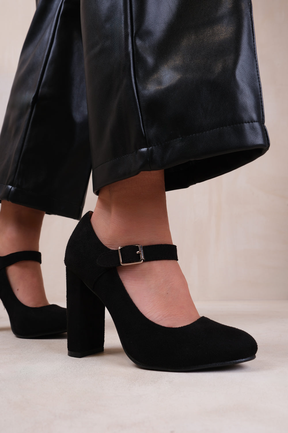 MICHELLE BLOCK HIGH HEEL PUMP WITH FRONT BUCKLE STRAP IN BLACK SUEDE