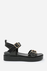 ISABEL WIDE FIT DOUBLE BUCKLE STRAP PLATFORM SANDALS IN BLACK FAUX LEATHER