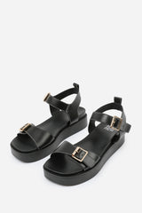 ISABEL WIDE FIT DOUBLE BUCKLE STRAP PLATFORM SANDALS IN BLACK FAUX LEATHER