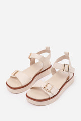 ISABEL DOUBLE BUCKLE STRAP PLATFORM SANDALS IN CREAM FAUX LEATHER