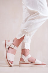 PHOENIX EXTRA WIDE FIT CLASSIC FLAT SANDALS WITH STRAP AND BUCKLE DETAIL IN CREAM FAUX LEATHER