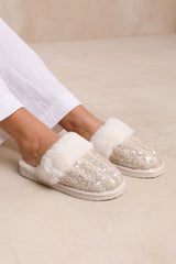 COZY SLIP ON SEQUIN SLIPPERS WITH FUR TRIM IN BEIGE