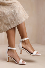 MADRID MID BLOCK HEEL WITH ANKLE STRAP IN WHITE PU