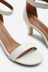 Calvia White Two Strap Mid Block Heels