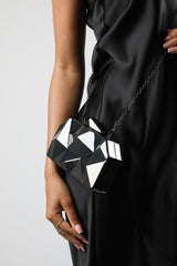 Rica Geometric Clutch Bag In Black