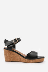 GISELLE  WEDGE SANDALS WITH BUCKLE ANKLE STRAP IN BLACK GRAIN PU