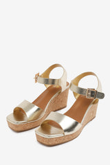 GISELLE  WIDE FIT WEDGE SANDALS WITH BUCKLE ANKLE STRAP IN GOLD GRAIN PU