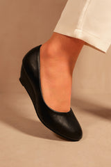 KIERAN PLATFORM LOW WEDGE MID HEEL COURT SHOES IN BLACK FAUX LEATHER