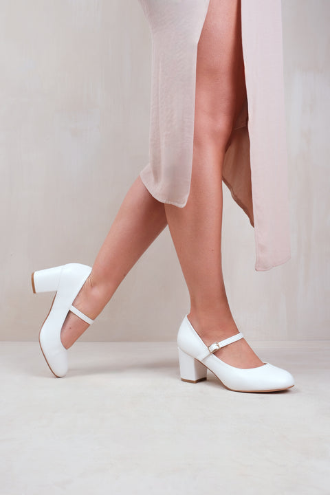 ARACELI BLOCK HEEL MARY JANE PUPMS IN WHITE FAUX LEATHER