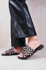 KELLIE WIDE FIT SLIDER SANDALS WITH CAGED STUDDED DETAILING IN BLACK FAUX LEATHER