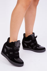 HITOP WEDGE TRAINERS WITH A FRONT LACE UP IN BLACK SUEDE