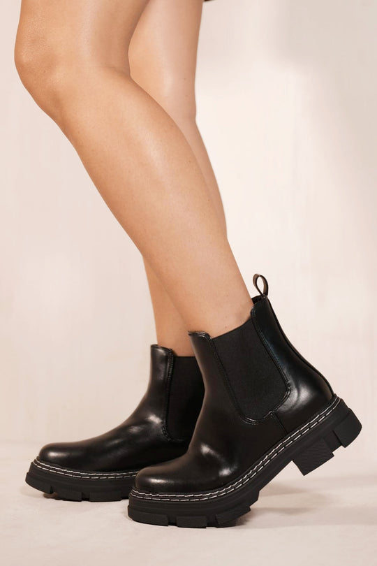 AMIYAH CHUNKY CHEALSEA BOOTS WITH KNITTED SOCK IN BLACK FAUX LEATHER