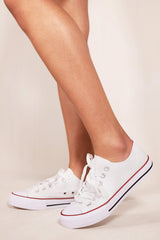 ALAZNE FLATFORM LACE UP TRAINERS IN WHITE CANVAS