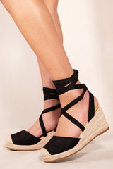 JUNIPER LOW WEDGE ESPADRILLE SANDALS WITH LACE UP DETAIL IN BLACK SUEDE