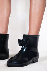 TRISH  LOW HEEL ANKLE WELLIES WITH BLACK BOW IN BLACK PATENT FAUX LEATHER