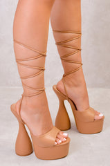 NORA FLARED HIGH HEELS WITH A LEG TIE IN CARAMEL MOCHA FAUX LEATHER