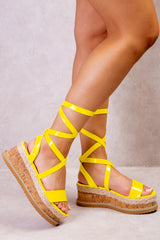 EVA TIE LEG FLATFORM ESPADRILLE SANDALS IN NEON YELLOW PATENT FAUX LEATHER