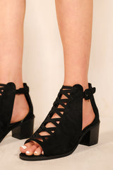 REYDAH MID HIGH BLOCK HEEL SANDALS WITH PEEP TOE & CRISS CROSS DETAIL IN BLACK SUEDE