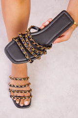 MEDUSA FOUR BRAIDED CHAIN DETAIL FLAT SANDALS IN BLACK FAUX LEATHER